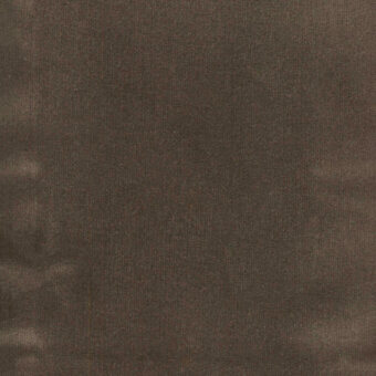 Brown velvet fabric texture with a dense pile, displaying a mottled effect and a “turri > fabric cat. b > 726 b” label.